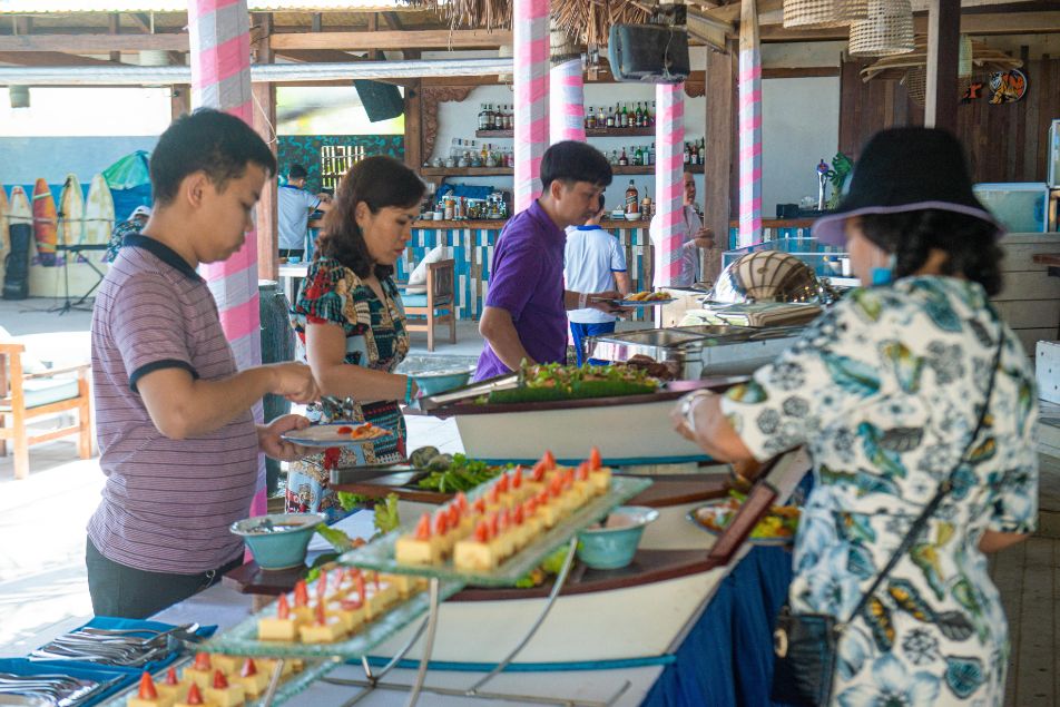 Guests enjoying the gourmet Sunday Easter buffet at Shore Club, An Bang Beach in Hoi An, Vietnam.