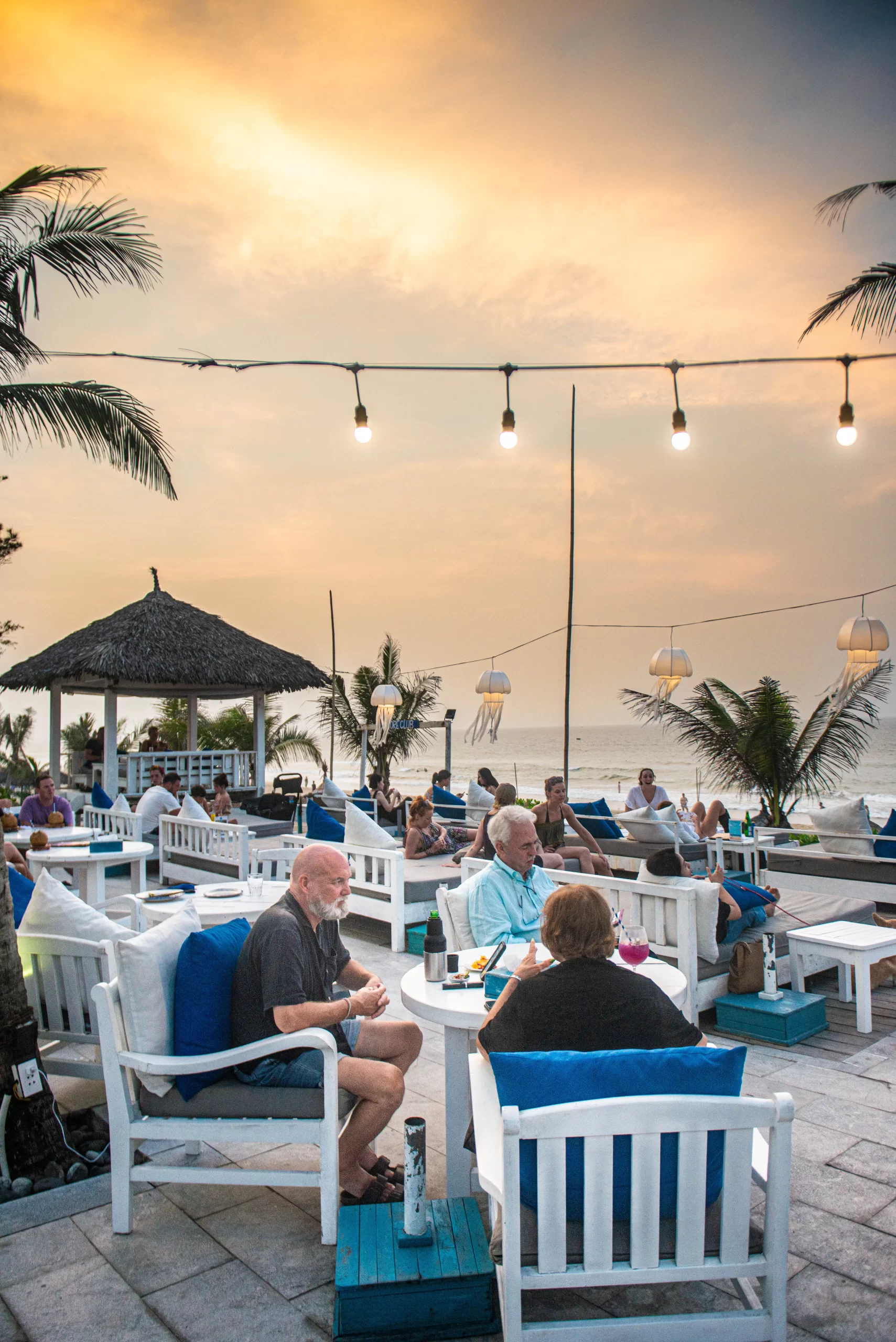 Shore Club guests enjoying a drink on An Bang Beach