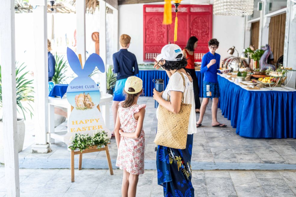 A family arriving at Shore Club, An Bang Beach, for the annual Easter Sunday Brunch in Hoi An.