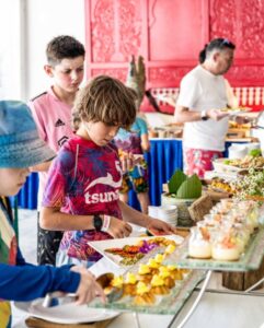 Children enjoying the gourmet buffet at Shore Club’s Easter Sunday Brunch in Hoi An.